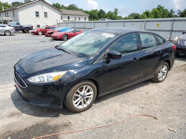 FORD FOCUS SE 2018 with VIN 1FADP3FE5JL331633 - Photo from auction