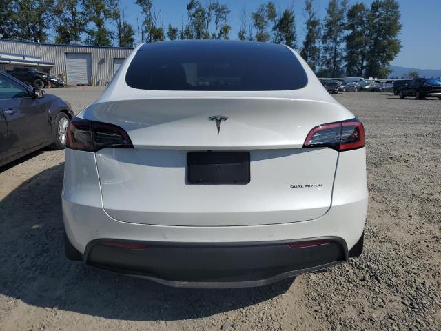 Photo 6 from auction – 2022 TESLA MODEL Y with VIN 7SAYGAEE2NF523847