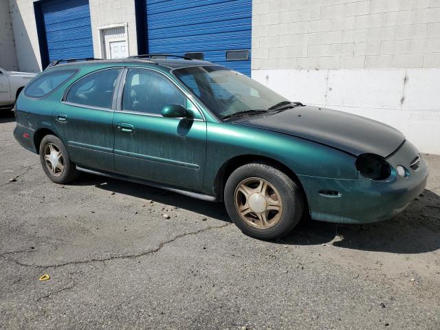 Photo 4 from auction – 1999 FORD TAURUS with VIN 1FAFP58U4XG174493