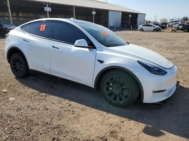 Photo 4 from auction – 2023 TESLA MODEL Y with VIN 7SAYGDEE0PF698554