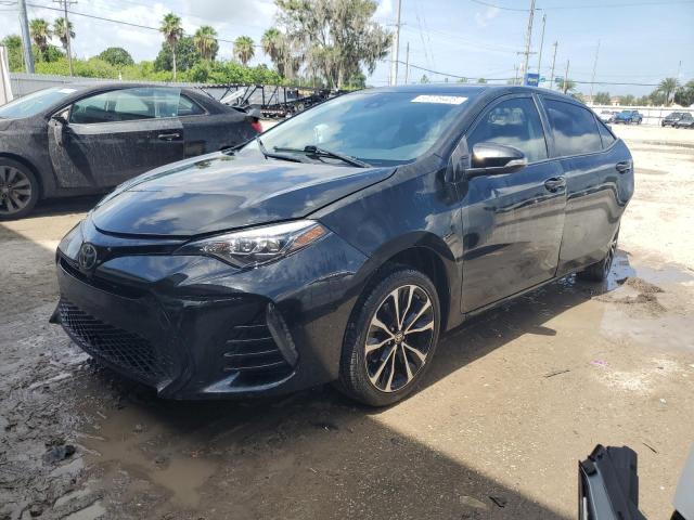 TOYOTA COROLLA L 2018 with VIN 5YFBURHE7JP823811 - Photo from auction