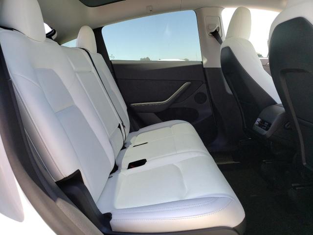 Photo 11 from auction – 2023 TESLA MODEL Y with VIN 7SAYGAEE0PF740011