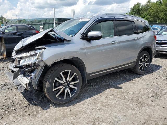 HONDA PILOT TOUR 2019 with VIN 5FNYF6H90KB054474 - Photo from auction