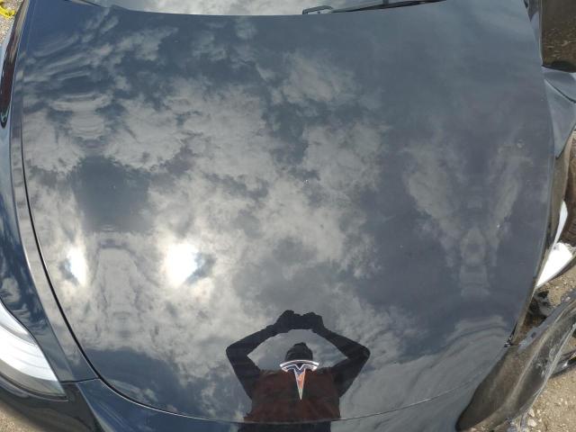 Photo 11 from auction – 2021 TESLA MODEL Y with VIN 5YJYGDEEXMF283511