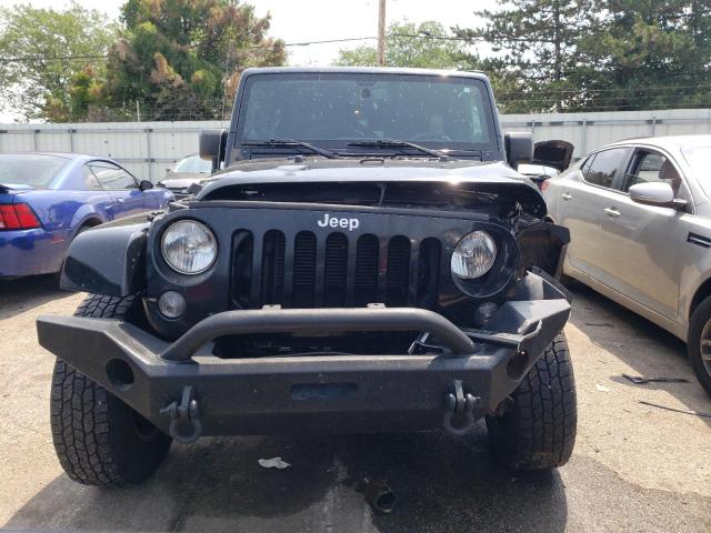 Photo 5 from auction – 2014 JEEP WRANGLER U with VIN 1C4HJWFG5EL325644