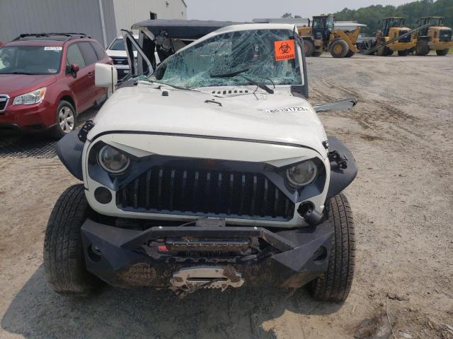 Photo 5 from auction – 2010 JEEP WRANGLER U with VIN 1J4BA5H1XAL228761