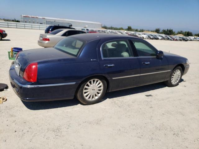 Photo 3 from auction – 2003 LINCOLN TOWN CAR E with VIN 1LNHM81W43Y638035