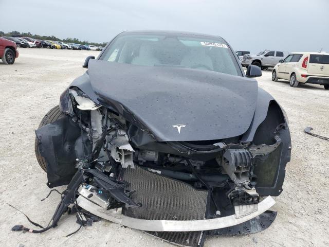 Photo 5 from auction – 2021 TESLA MODEL 3 with VIN 5YJ3E1EAXMF982861