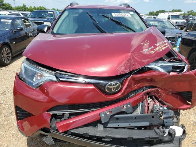 Photo 11 from auction – 2018 TOYOTA RAV4 LE with VIN JTMZFREV9JD112885