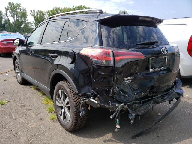 Photo 2 from auction – 2017 TOYOTA RAV4 XLE with VIN 2T3RFREV0HW651859