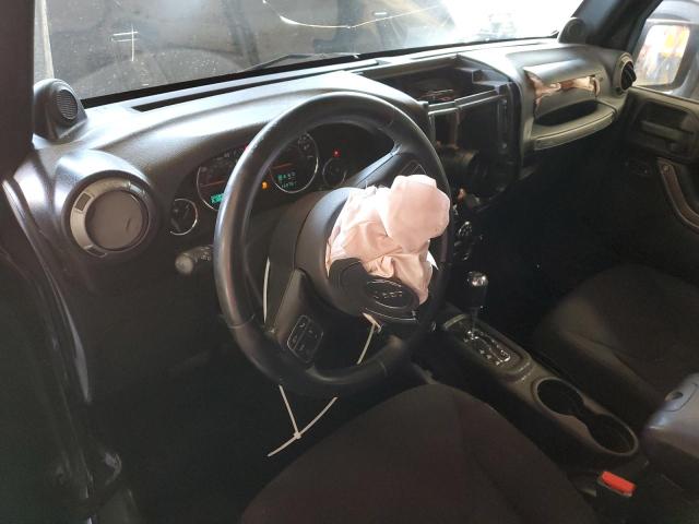 Photo 8 from auction – 2014 JEEP WRANGLER U with VIN 1C4BJWDG0EL250781