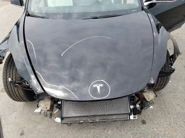 Photo 11 from auction – 2019 TESLA MODEL 3 with VIN 5YJ3E1EA4KF419284