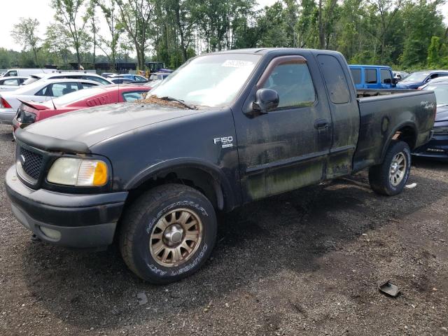 FORD F150 2002 with VIN 1FTRX18L12NA76999 - Photo from auction