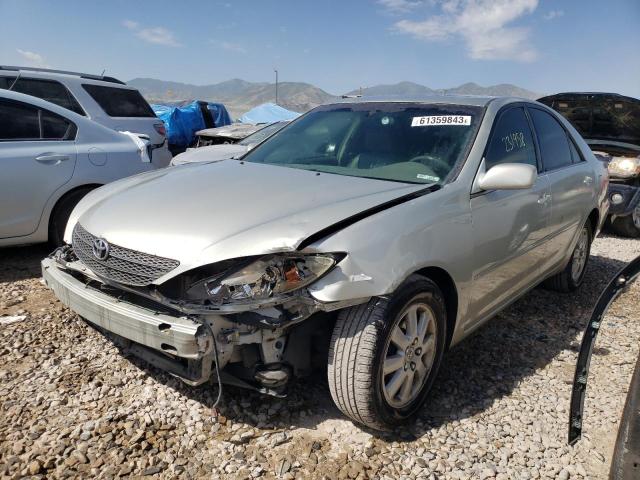 TOYOTA CAMRY LE 2003 with VIN JTDBF30K030089003 - Photo from auction