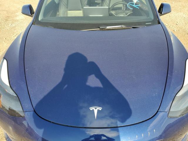 Photo 11 from auction – 2022 TESLA MODEL 3 with VIN 5YJ3E1EA8NF304143