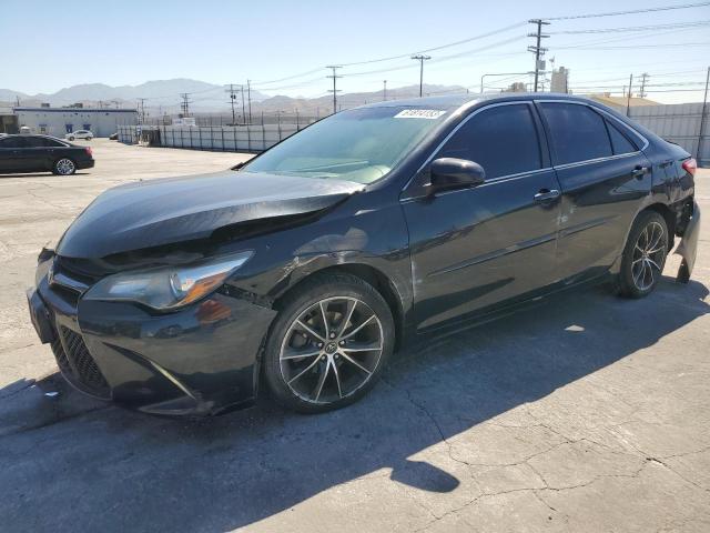 TOYOTA CAMRY LE 2015 with VIN 4T1BF1FK0FU965136 - Photo from auction