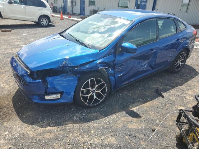 FORD FOCUS SE 2018 with VIN 1FADP3FE0JL267128 - Photo from auction