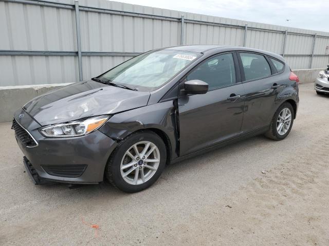 FORD FOCUS SE 2018 with VIN 1FADP3K20JL303329 - Photo from auction
