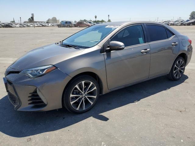 TOYOTA COROLLA L 2017 with VIN 5YFBURHE2HP698954 - Photo from auction