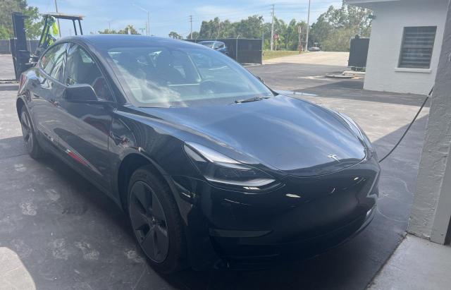 TESLA MODEL 3 2022 with VIN 5YJ3E1EA7NF288856 - Photo from auction