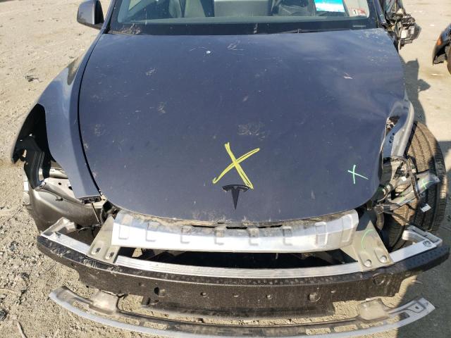 Photo 11 from auction – 2023 TESLA MODEL Y with VIN 7SAYGAEE0PF639017