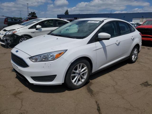FORD FOCUS SE 2018 with VIN 1FADP3F21JL216260 - Photo from auction