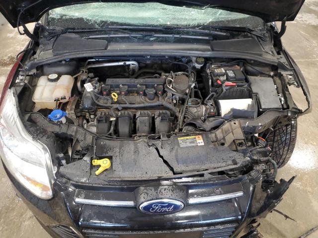Foto 11 de la subasta – 2013 FORD FOCUS SE con VIN 1FADP3F21DL255189