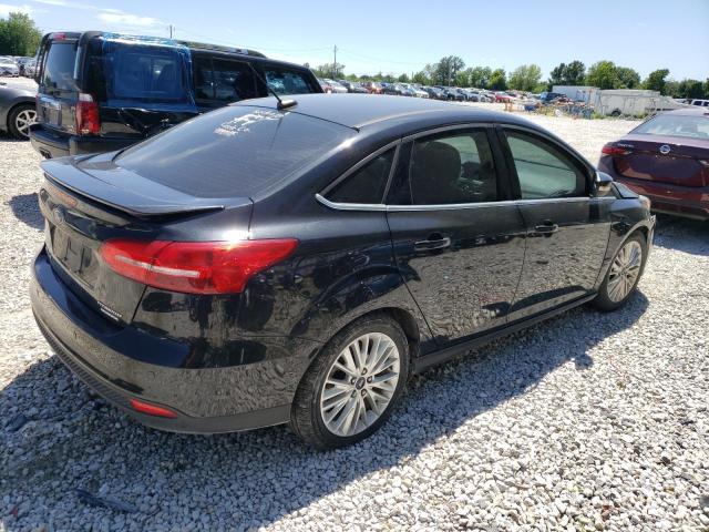 Photo 3 from auction – 2015 FORD FOCUS TITA with VIN 1FADP3J27FL354299