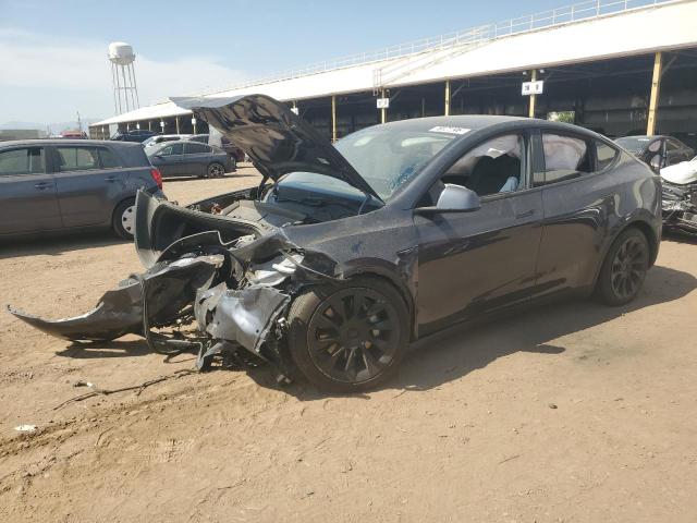 TESLA MODEL Y 2022 with VIN 7SAYGDEE2NF387382 - Photo from auction