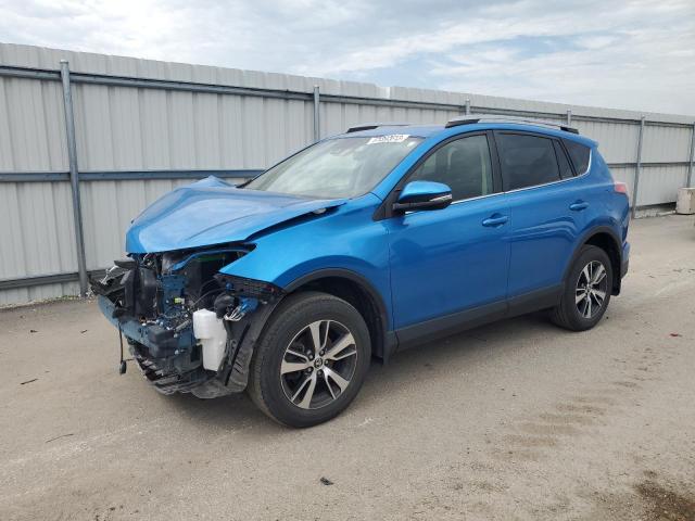 TOYOTA RAV4 XLE 2017 with VIN JTMRFREV0HJ716451 - Photo from auction