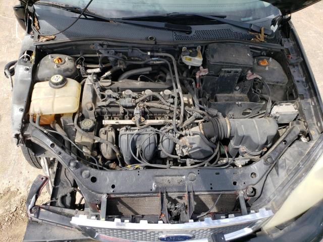 Photo 11 from auction – 2007 FORD FOCUS ZX3 with VIN 1FAFP31N37W173851