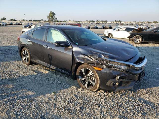 Photo 4 from auction – 2016 HONDA CIVIC TOUR with VIN 19XFC1F92GE213482