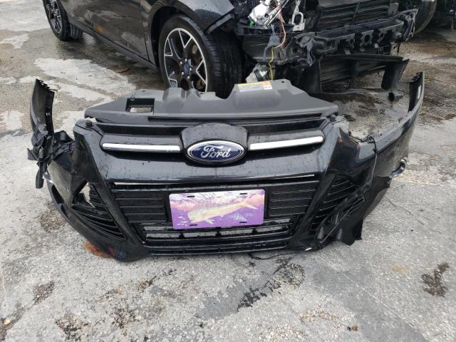 Photo 12 from auction – 2013 FORD FOCUS SE with VIN 1FADP3K29DL104610