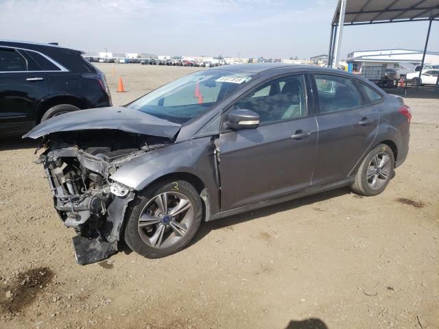 FORD FOCUS SE 2014 with VIN 1FADP3F29EL363450 - Photo from auction