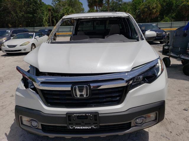 Photo 5 from auction – 2020 HONDA RIDGELINE with VIN 5FPYK3F73LB023885