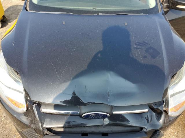 Photo 11 from auction – 2014 FORD FOCUS SE with VIN 1FADP3F29EL324695