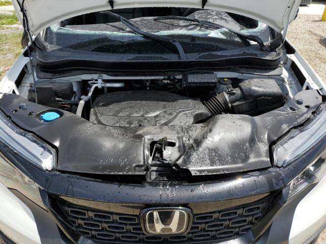 Foto 12 de la subasta – 2021 HONDA PASSPORT E con VIN 5FNYF7H53MB005226