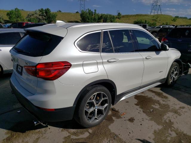 Photo 3 from auction – 2017 BMW X1 XDRIVE2 with VIN WBXHT3C32H5F83452