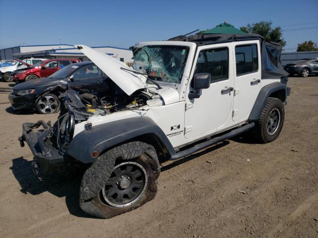 JEEP WRANGLER U 2009 with VIN 1J4GB39109L745259 - Photo from auction