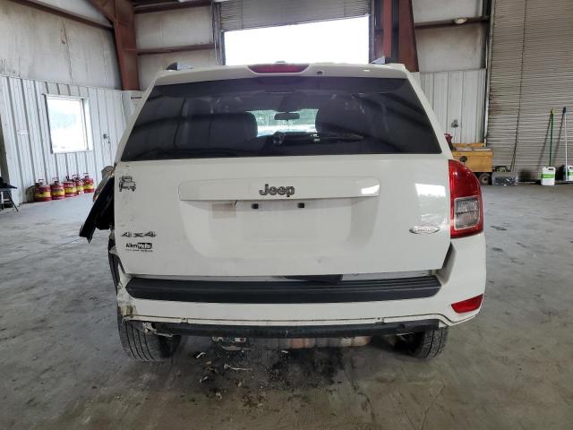 Photo 6 from auction – 2012 JEEP COMPASS LA with VIN 1C4NJDEB9CD572721