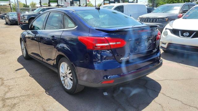 Photo 3 from auction – 2016 FORD FOCUS TITA with VIN 1FADP3J21GL233771