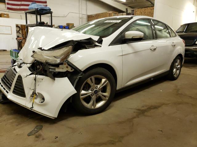 FORD FOCUS SE 2014 with VIN 1FADP3F23EL169335 - Photo from auction