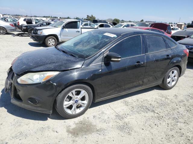FORD FOCUS SE 2014 with VIN 1FADP3F29EL259203 - Photo from auction