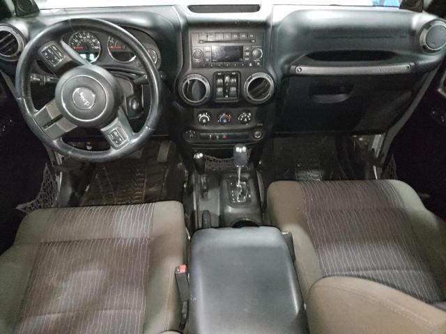 Снимка 8 от търг – 2012 JEEP WRANGLER U с VIN 1C4BJWDG2CL203524