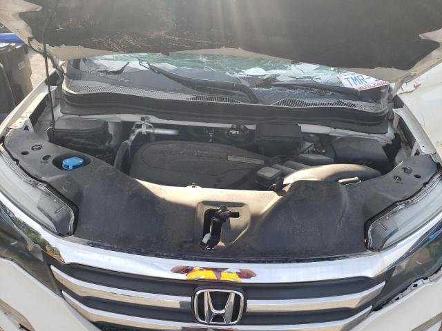 Photo 12 from auction – 2018 HONDA PILOT LX with VIN 5FNYF5H14JB006172