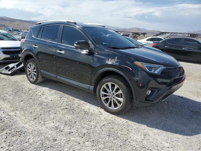 Photo 4 from auction – 2016 TOYOTA RAV4 LIMIT with VIN 2T3YFREV2GW238464