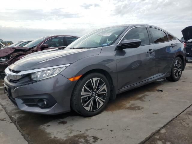 HONDA CIVIC EXL 2018 with VIN JHMFC1F79JX013865 - Photo from auction