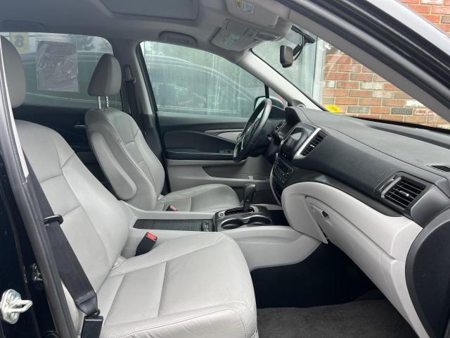 Photo 5 from auction – 2016 HONDA PILOT EXL with VIN 5FNYF6H56GB055181