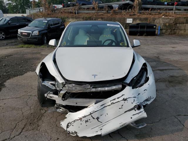 Photo 5 from auction – 2021 TESLA MODEL Y with VIN 5YJYGDEEXMF268765