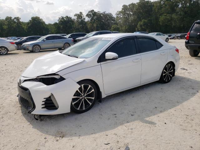 TOYOTA COROLLA L 2018 with VIN 5YFBURHE7JP786341 - Photo from auction